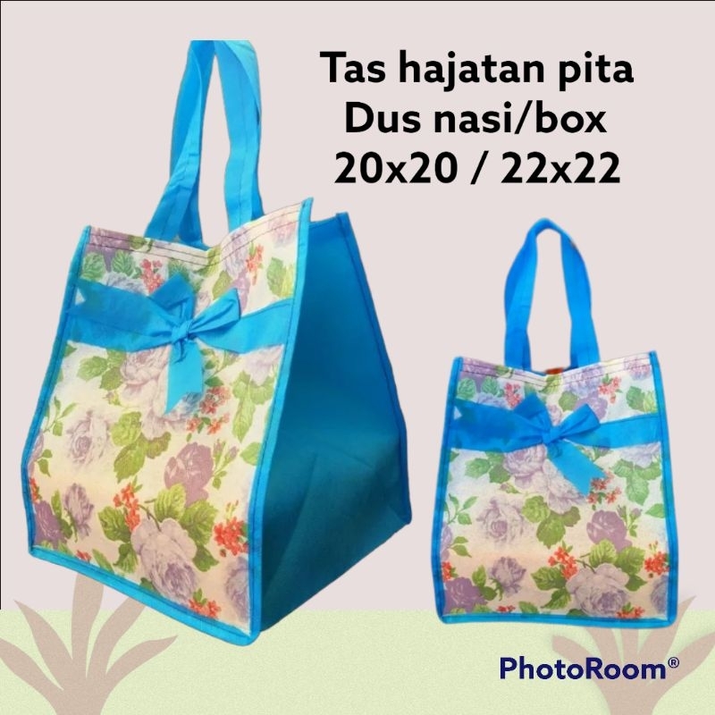 

TAS HAJATAN PITA ISI 12PCS UNTUK DUS/BOX NASI 20X20/ 22X22