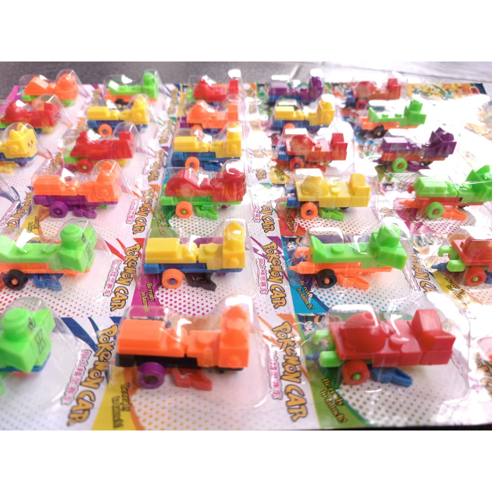 MOBIL MOBILAN KECIL LEGO POKEMON PLASTIK WARNA WARNI 1 LEMBAR ISI 30 PCS