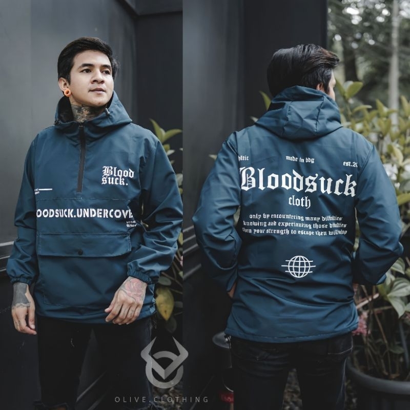 Jaket pria parasut cagoule kantong doraemon