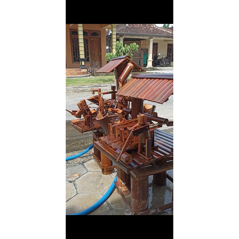 kincir air bambu bernada .hiasan kolam.ikan koi