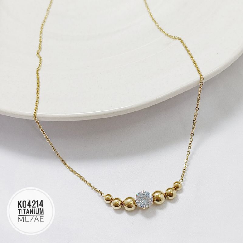 Kalung titanium bola permata gold K04214