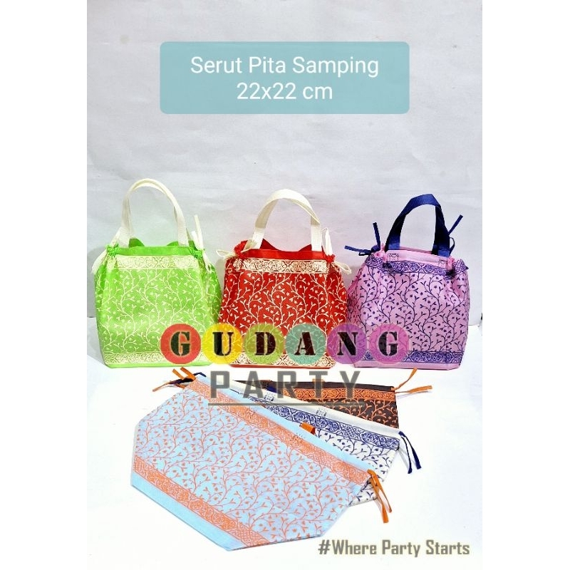 

Spunbond Goodie bag Serut Motif Pita Samping 22 Cm