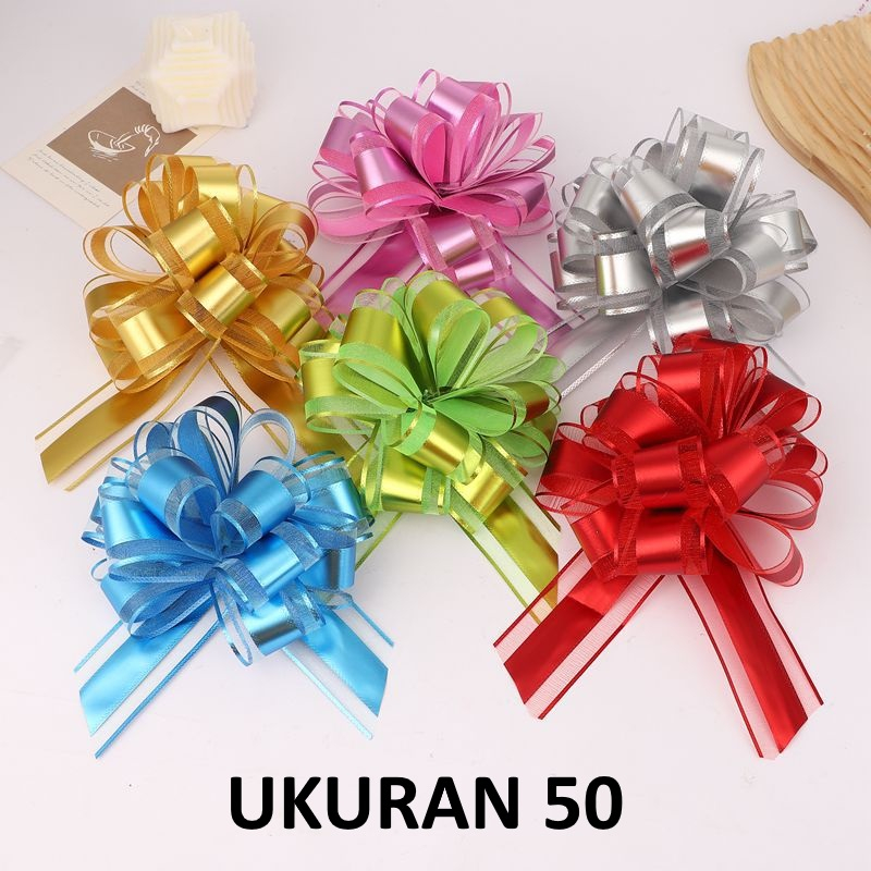 

Pita Tarik Pita Dekorasi Pita Kado Pita Bingkisan Pita Parsel Pita Hampers Pita Goodie Bag Polos Glossy Ukuran 50
