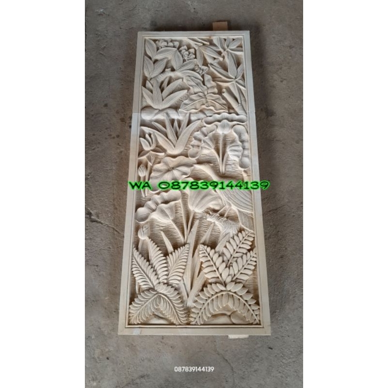 hiasan dinding batu ukir