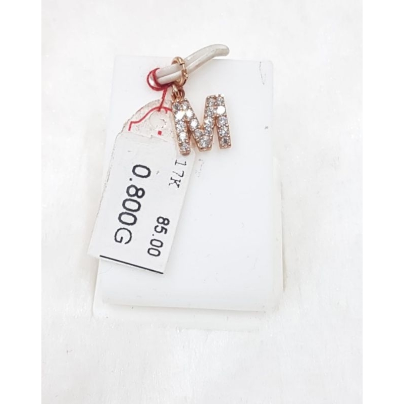 Liontin emas 75 huruf M