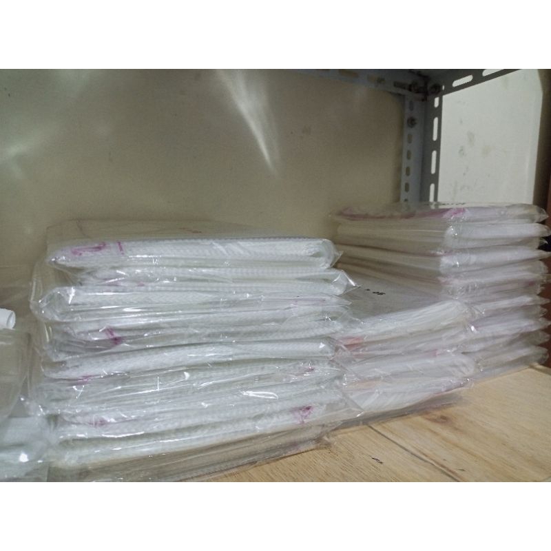 Plastik Opp baju tebal 0.5 ukuran 28x35 / plastik opp packing 28 x 35 seal lem isi 100 lembar