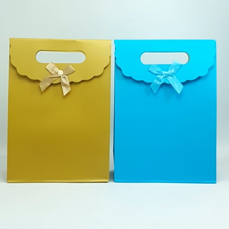 

Paper Bag Pita Tutup Sedang Polos / Kantong Kertas Bingkisan Hadiah