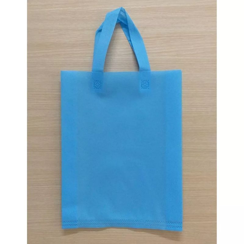 

READY STOK tas press spunbond polos ukuran 25x8x35 cm (Tebal 75.gsm)