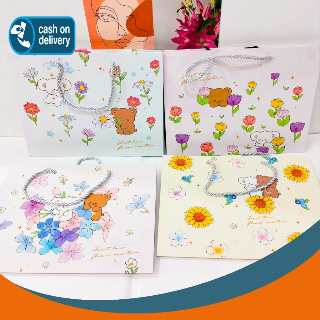 

PAPER BAG BERUANG BUNGA CD-001 UKURAN 22 X 16 X 12 CM KANTONG HAMPERS GOODIE BAG TERMURAH COD