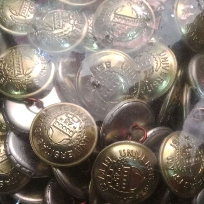 kancing jaket almamater UNISMA bekasi