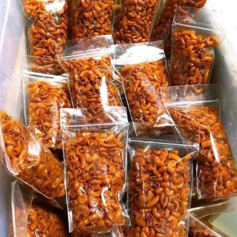 

MAKARONI KEMASAN 100 GR RASA PEDAS DAUN JERUK