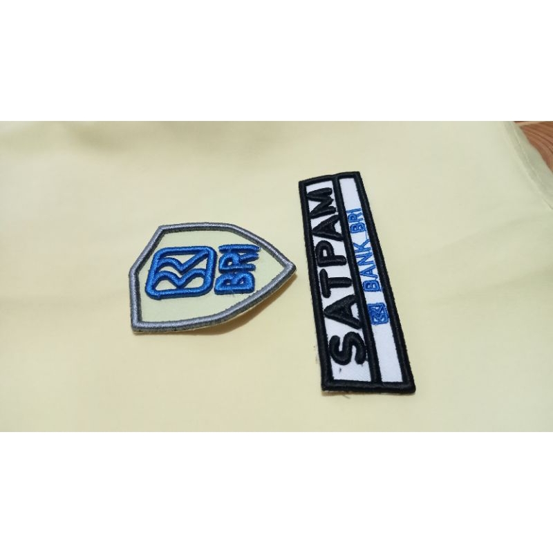 BORDIR TULISAN SATPAM BRI DAN LOGO BRI TIMBUL