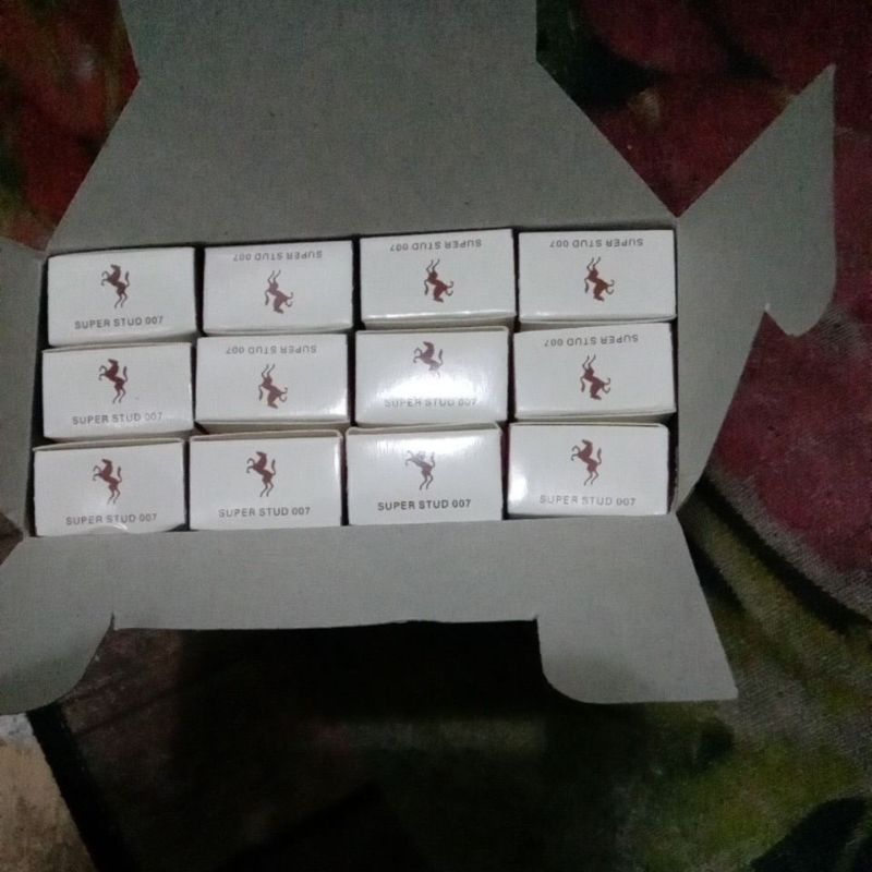 cream stud 007 1box isi 12biji
