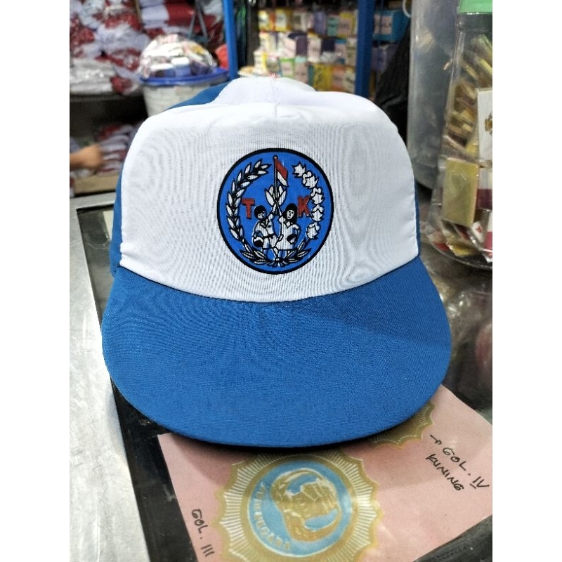 topi TK biru benhur putih cowok