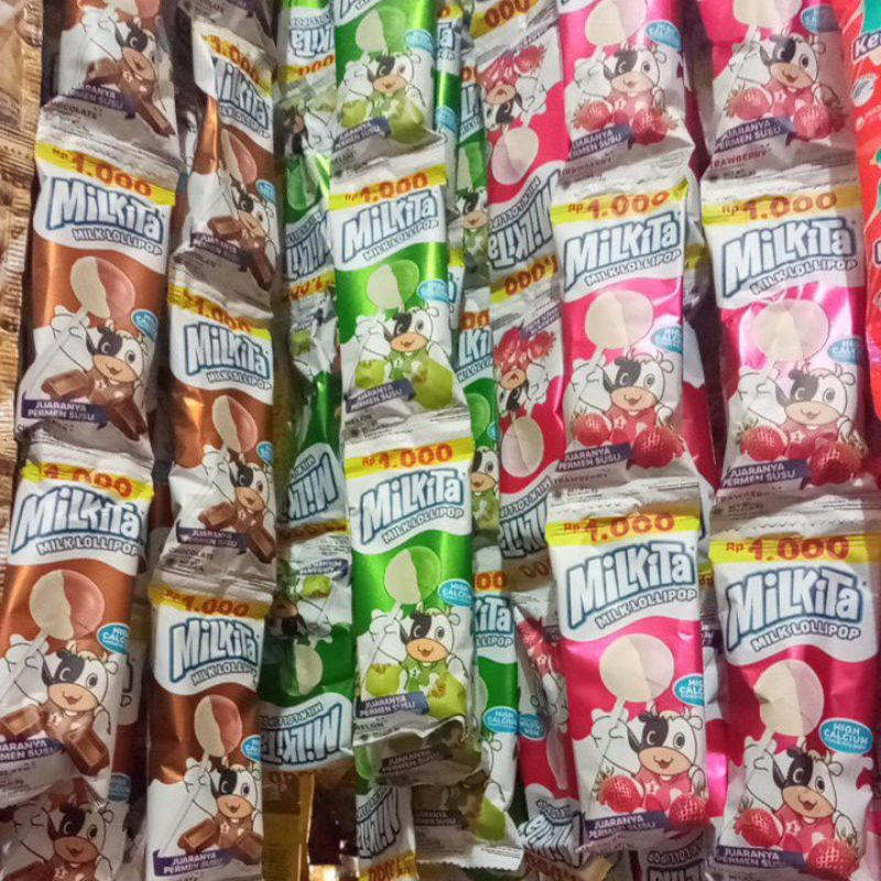 

Permen milkita lollipop 1 Renceng isi 10