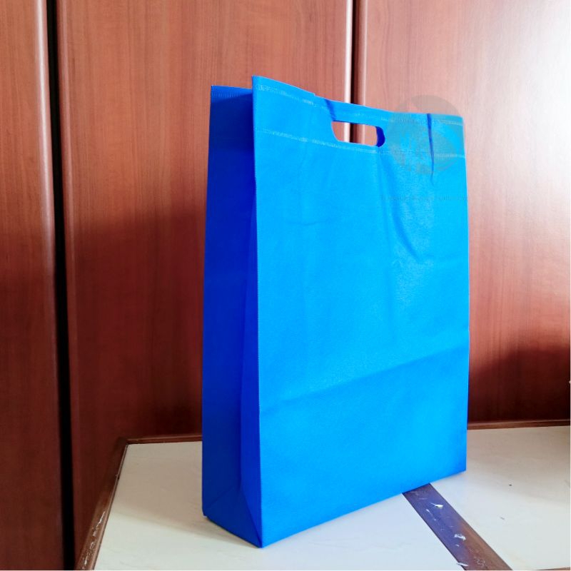 

Tas Spunbond SOS goodie bag oval 30x10x40 murah press/spunbun/tas kain