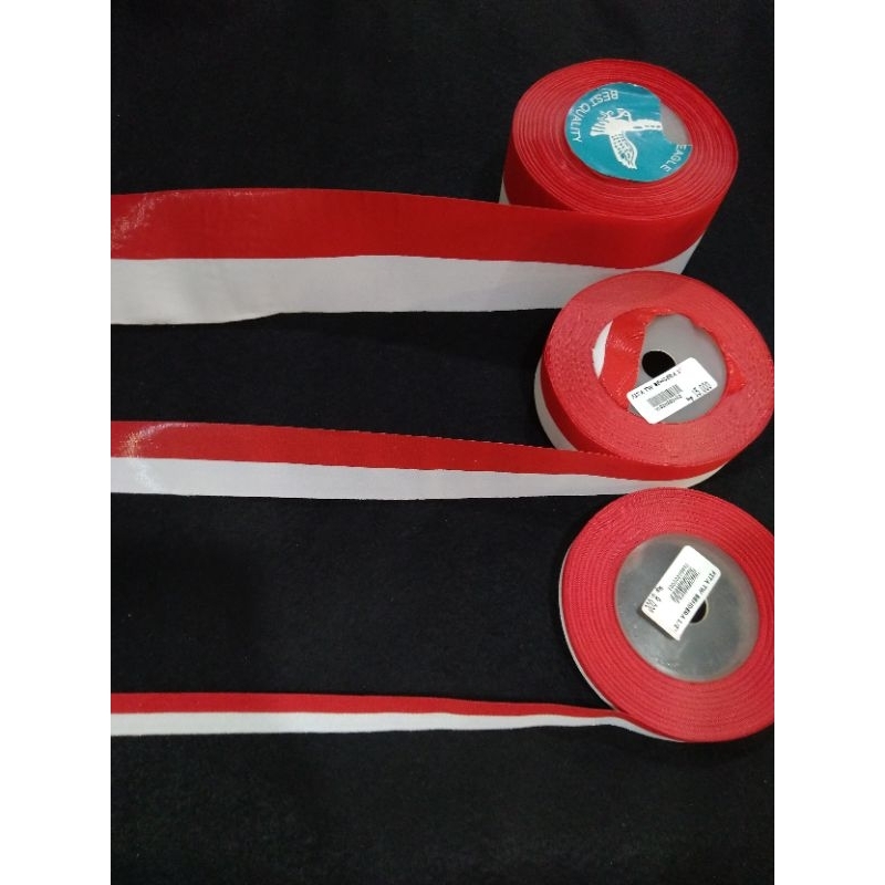 

pita bendera merah putih | pita kemerdekan | pita agustusan | serba serbi agustus | pita bendera rollan