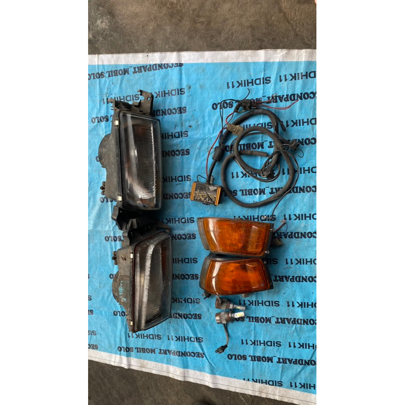 Headlamp Mazda interplay set 323 Original