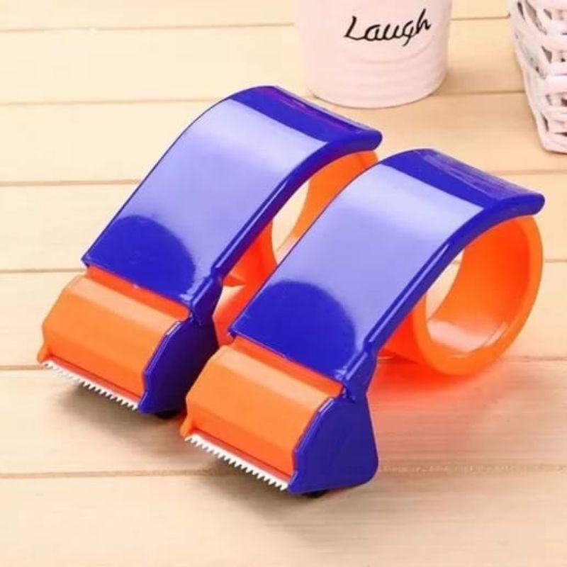 

Tape Cutter/Alat bantu packing/ dispenser isolasi/ lakban