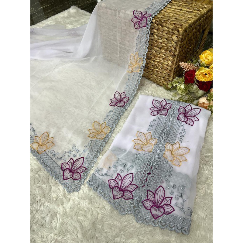 kain bordir motif tunjung