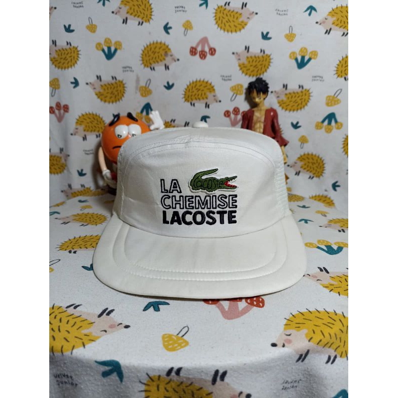 topi lacoste