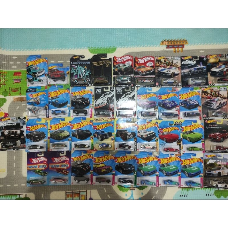 Hotwheels lancer evo, mercedes benz clk gtr, & mazda rx7 falken