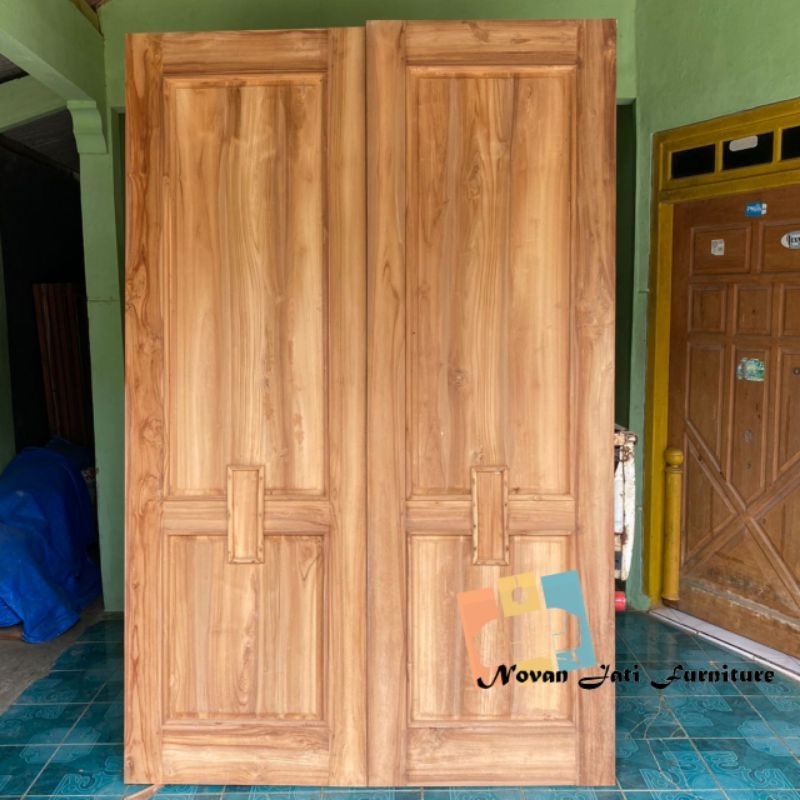 pintu kupu tarung - pintu utama kayu jati