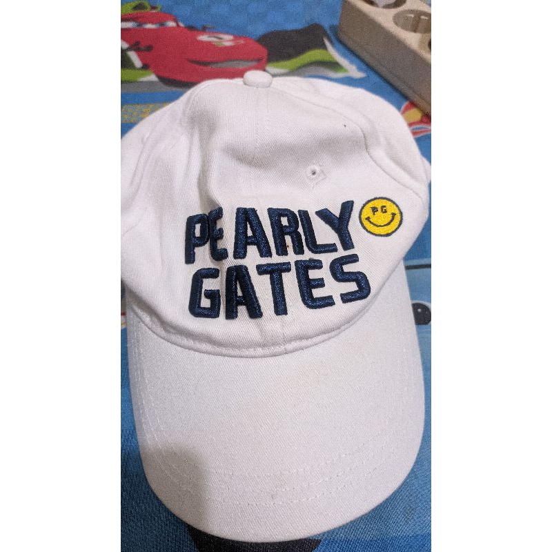 Topi Pearly Gates