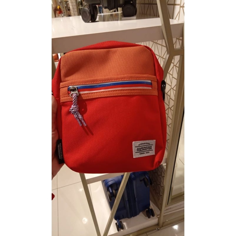 TAS SELEMPANG AMERICAN TOURISTER ORIGINAL RED