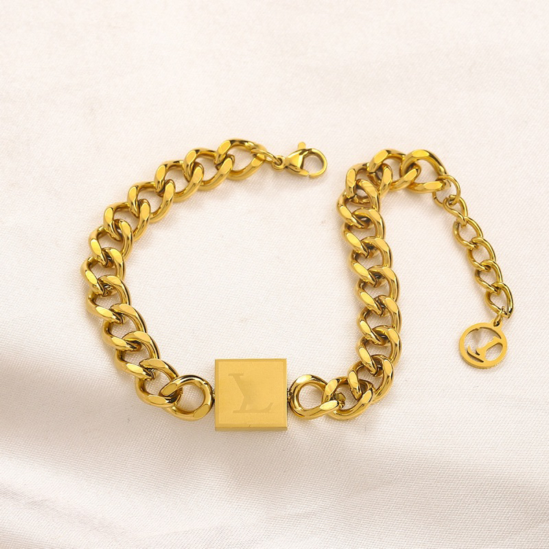 gelang titanium sisik naga lv cantik