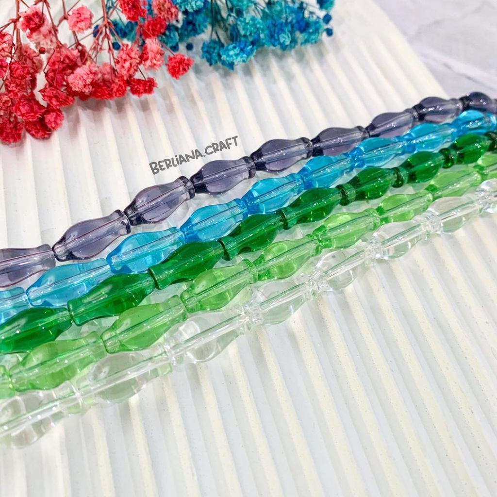 Manik Kaca Bentuk Guci