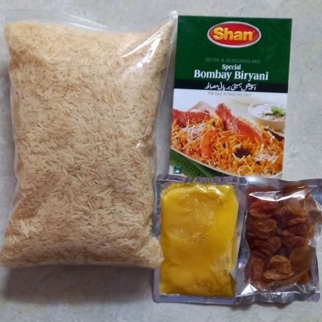 

Paket Beras Basmati 1Kg, Bumbu SHAN Biryani, Minyak Samin & Kismis