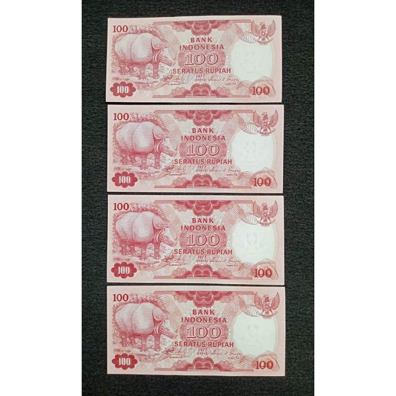 UANG KUNO 100 RUPIAH BADAK TAHUN 1977 BARU