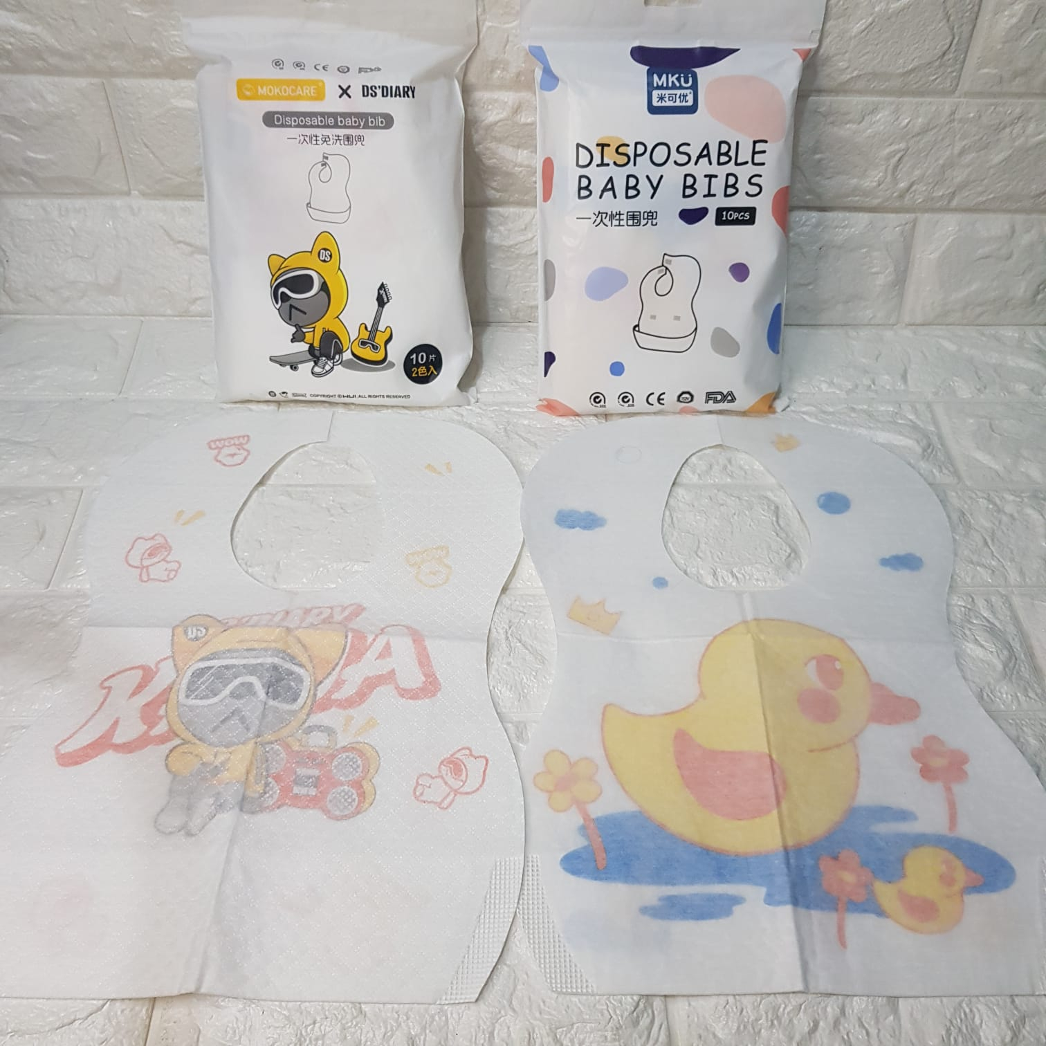 MH - disposable baby bib - slabber sekali pakai - celemek bayi sekali pakai