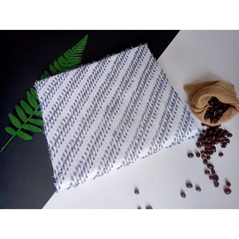 Kain Tenun Bulu Putih