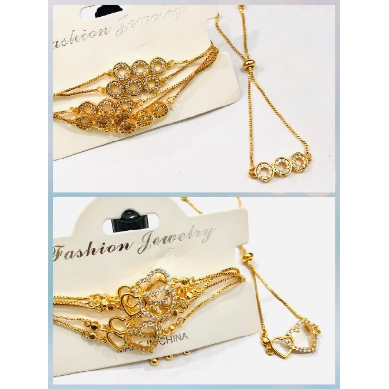 Gelang serut wanita xuping berlapis emas dengan mata zircon.