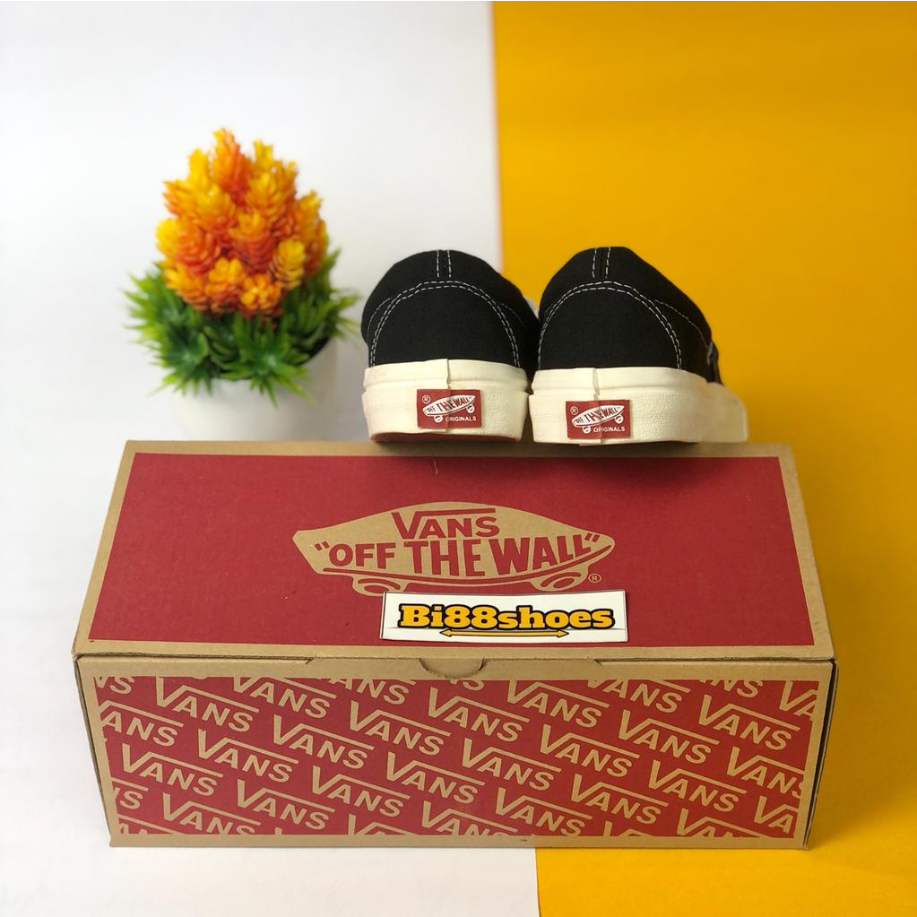 Sepatu Vans slip on og black white pria wanita keren