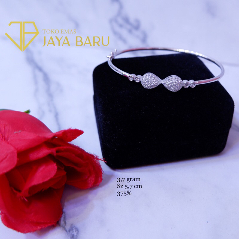 gelang kaku tear silang white gold