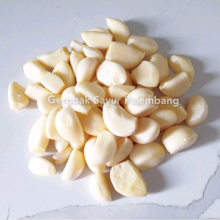 

Bawang Putih Kupas - Gerobak Sayur Palembang