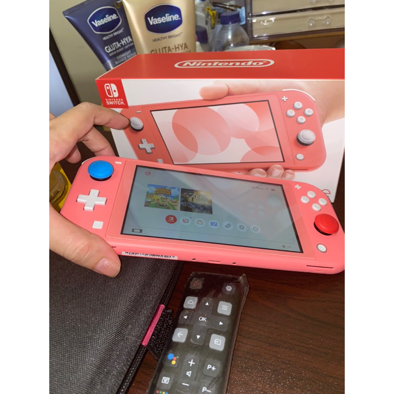 Preloved Nintendo Switch Lite Second Coral Edition