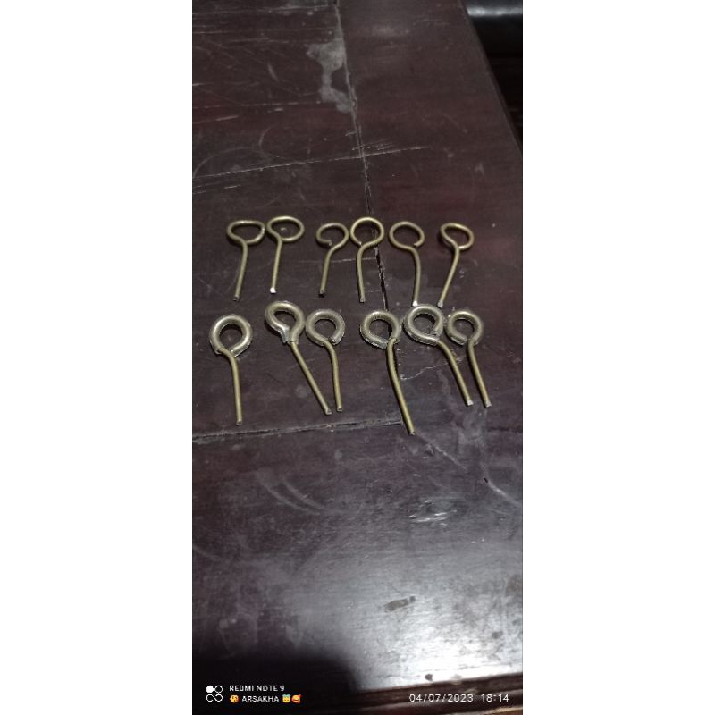 Kancing slorokan sangkar burung