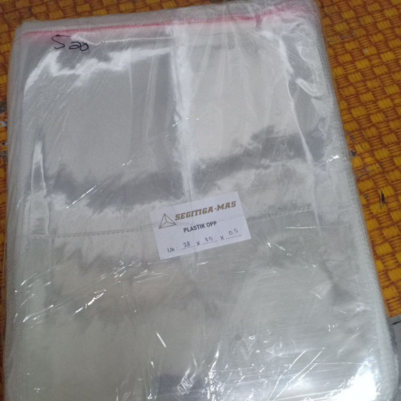 

(ecer) plastik packing OPP 28x35 cm bening berperekat ketebalan 23mc