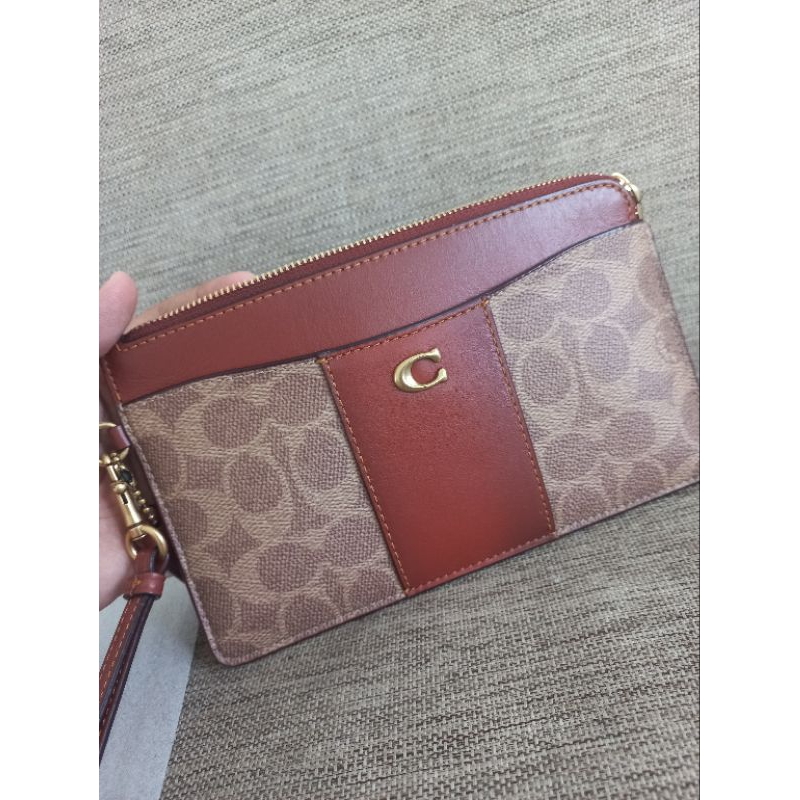 Coach wrislet tan rust