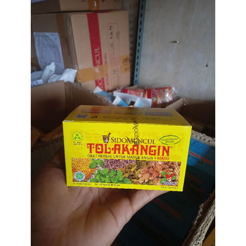 tolak angin cair ISI 12