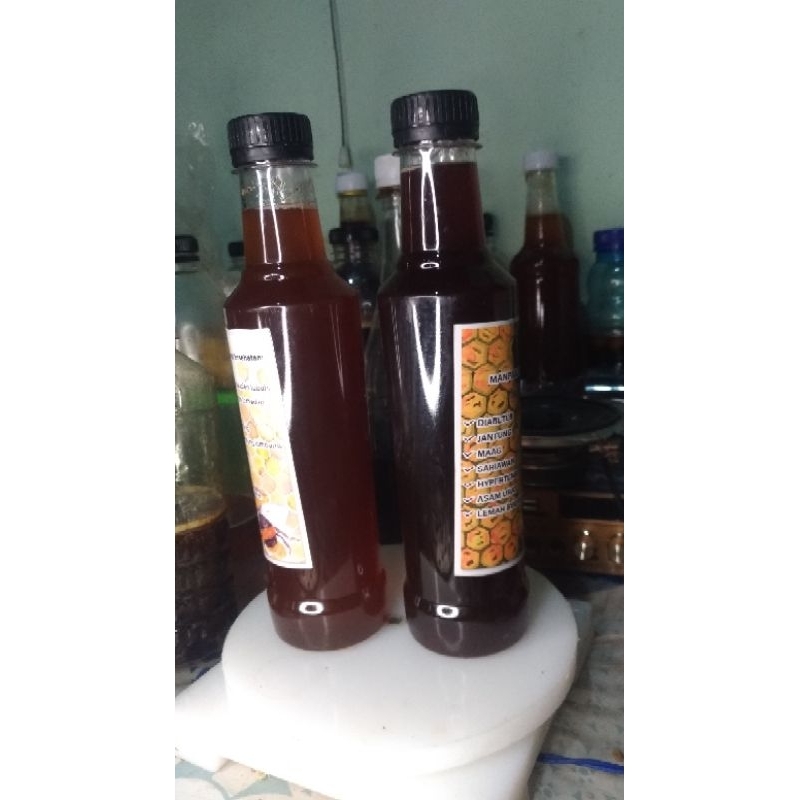 

2 botol madu hutan liar (1 botol manis 1 botol pahit)