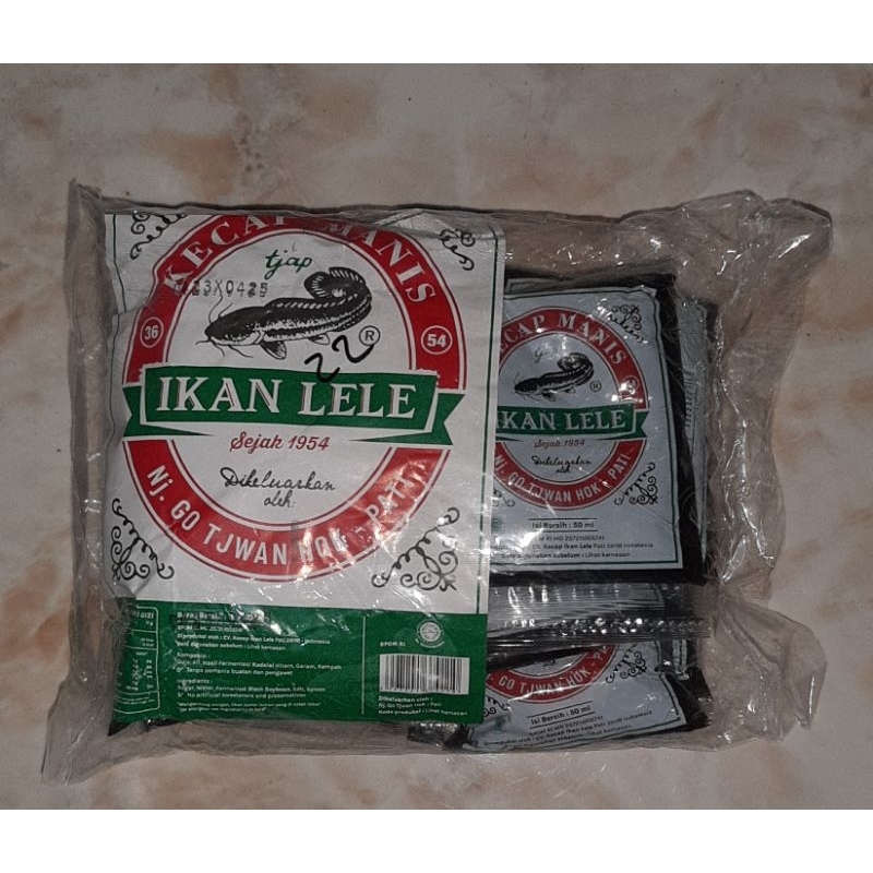 

Kecap Manis Cap Ikan Lele Khas Pati - Nj. Go Tjwan Hok (Pack Isi 12 X 50 Ml)