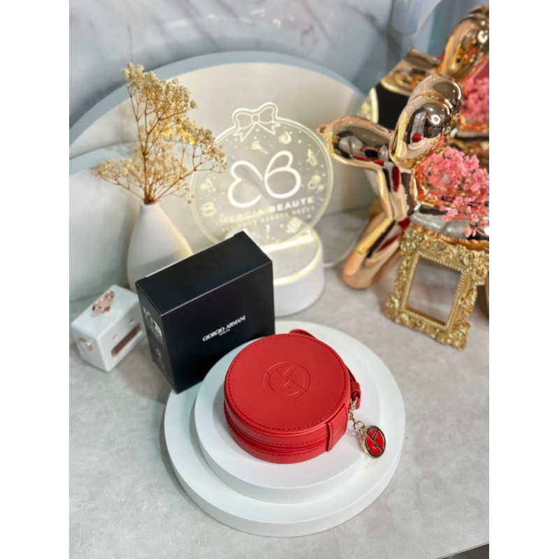 Giorgio Armani red cushion vanity