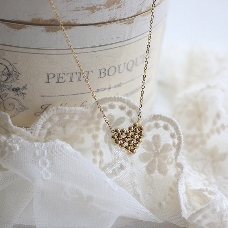 kalung titanium hati bulat unik