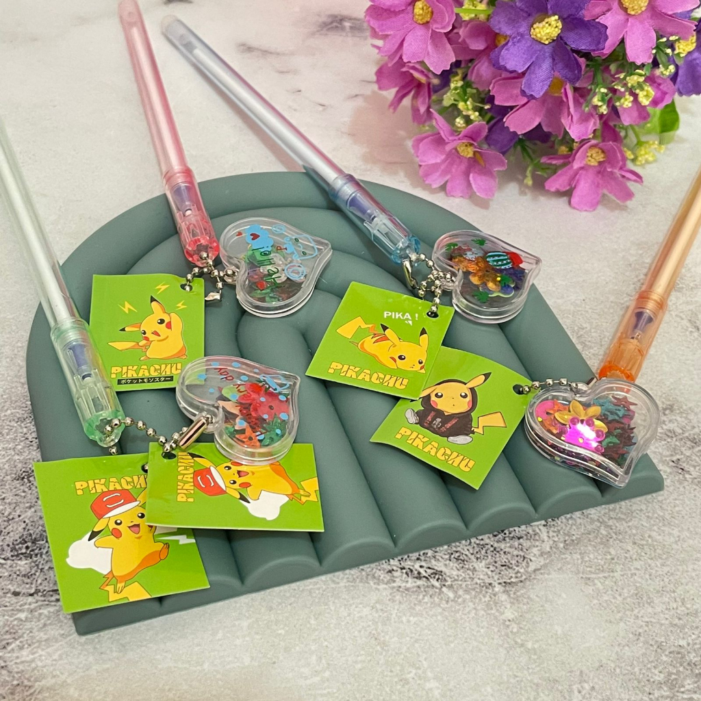 

Pulpen dengan gantungan lucu pikachu hati