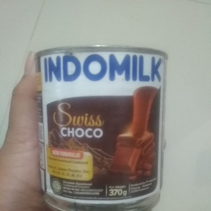 

indomilk kaleng cokelat